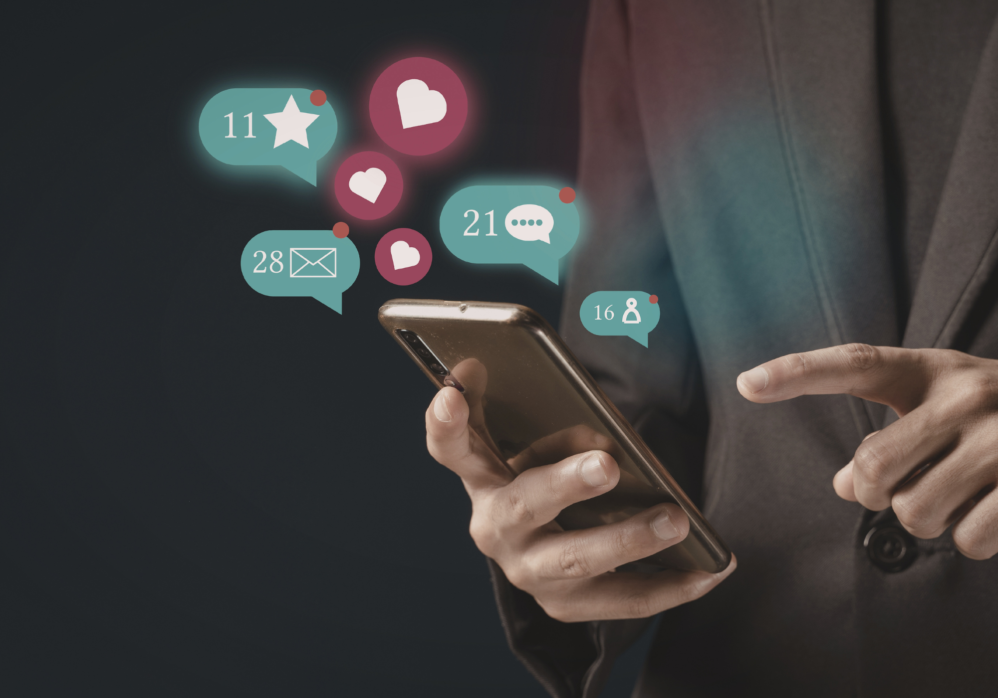 Person holding a smartphone with animated icons indicating notifications on a dark background